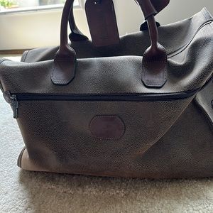 Jack George’s brown Leather travel bag